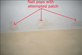 improper-drywall-patch-example.png Example of an improperly patched drywall repair with visible seams and poor finishing.
