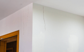 smooth-drywall-wall-finish-.png Freshly finished interior drywall wall with a smooth Level 5 finish ready for painting.